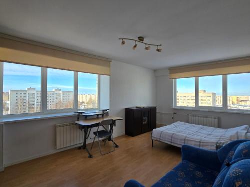 Postel nebo postele na pokoji v ubytování Hero Avenue Apartment