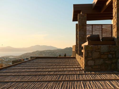 a roof of a building with a view of the ocean at Mykonos Rocks Villas & Suites in Mýkonos City
