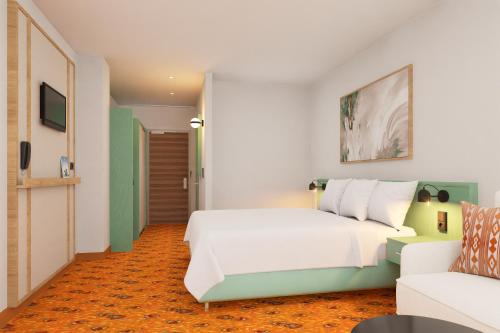 Postel nebo postele na pokoji v ubytování IFA Schöneck Hotel & Ferienpark