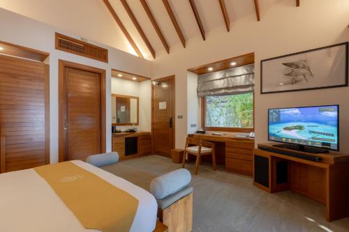 TV a/nebo společenská místnost v ubytování Dhigufaru Island Resort