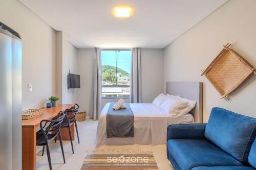 Et opholdsområde på Estúdios na Barra em Balneário Camboriú - DPR