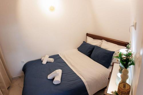 Kozani Central Nest - Homely Vibesにあるベッド