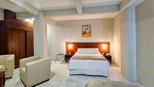 Кровать или кровати в номере Hotel Maywa