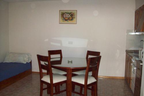 Kuchyň nebo kuchyňský kout v ubytování Muras Apart Hotel