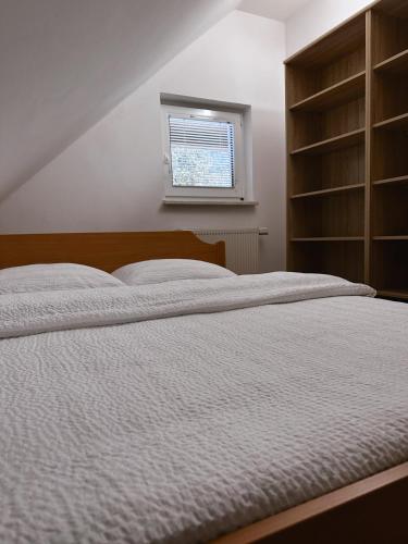 Postel nebo postele na pokoji v ubytování Apartma Neja Rogla