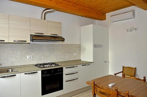 Cucina o angolo cottura di Residenza La Piazzetta