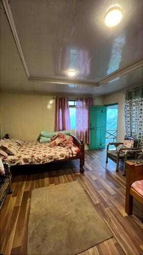 Postel nebo postele na pokoji v ubytování Sunrise Eco Stay