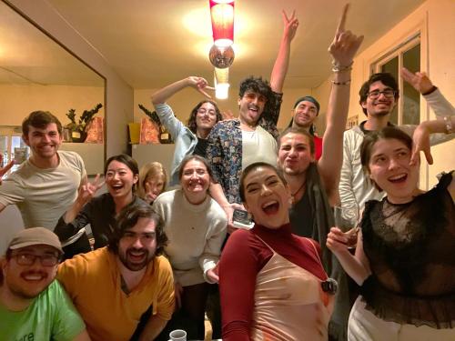 a group of people posing for a picture at Astor Museum Hostel in London