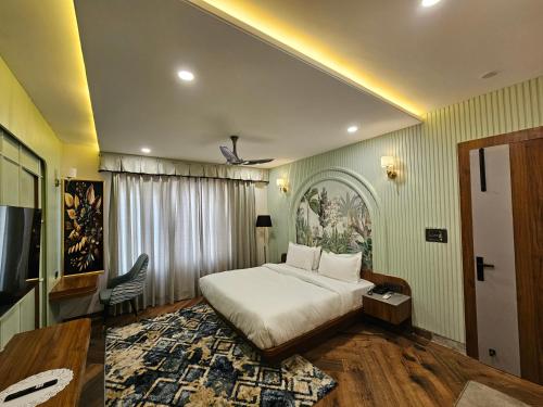 Una cama o camas en una habitación de The Blu Pearl