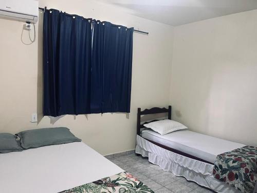 Katil atau katil-katil dalam bilik di Hotel Coutinho Pio XII