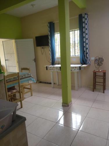 Televisyen dan/atau pusat hiburan di Casa Ilha Comprida
