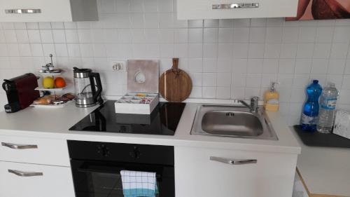 Kuchyň nebo kuchyňský kout v ubytování Casa SAFFI
