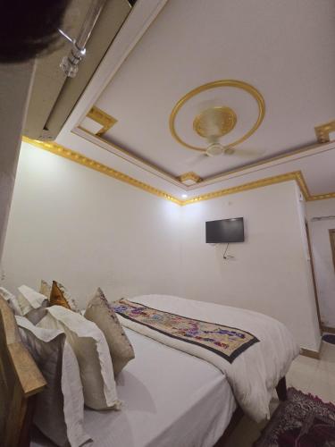 Postel nebo postele na pokoji v ubytování Hotel Darsh Safari - Fort View