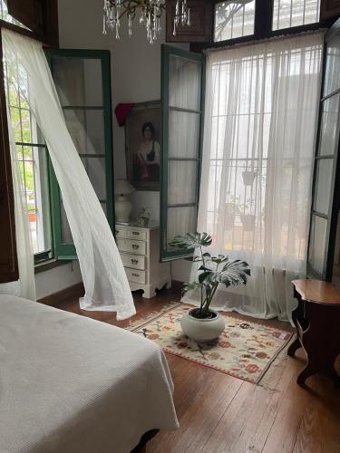 En eller flere senge i et værelse på Departamento verde en casco histórico