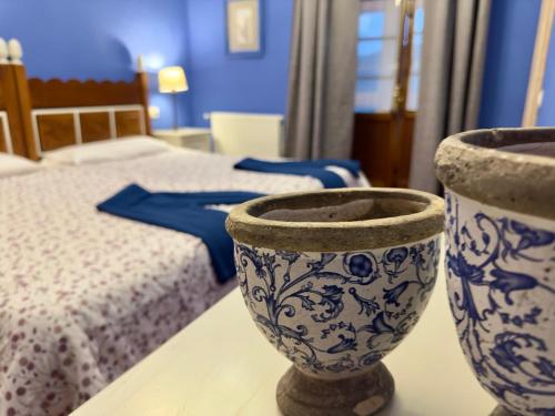 Una cama o camas en una habitación de Hotel Palacio de Libardon