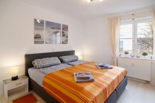 Postel nebo postele na pokoji v ubytování Ruhige Ferienwohnung in Bad Saulgau