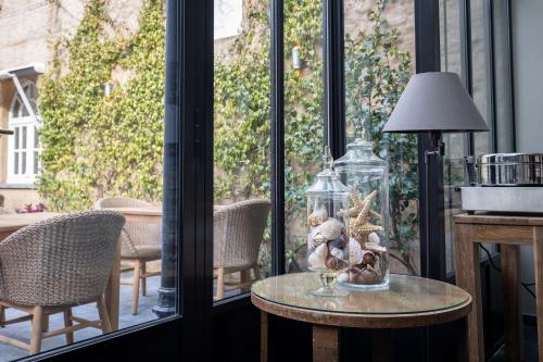 Posezení v ubytování Hotel Ter Duinen