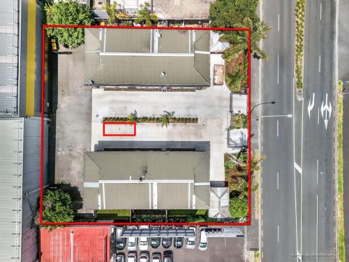 an overhead view of a building next to a street at In the Heart of Hamilton! Modern and Convenient #5 -By KOSH BNB in Hamilton
