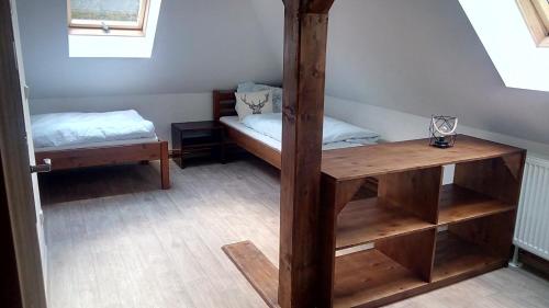 Cama o camas de una habitación en Stoječín 39