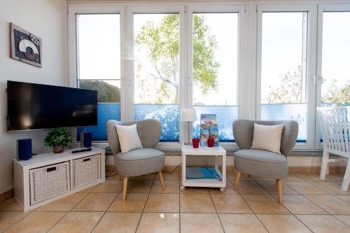 Televiisor ja/või meelelahutuskeskus majutusasutuses Villa Blanck