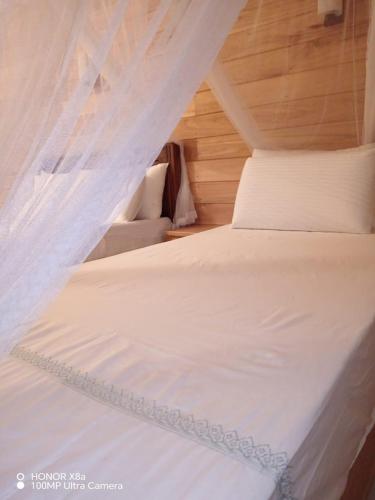 Voodi või voodid majutusasutuse Lotus Ella Homestay toas