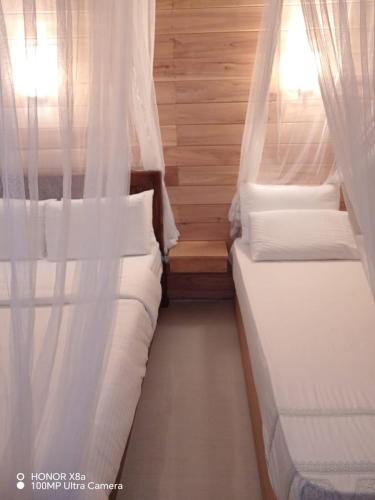 Voodi või voodid majutusasutuse Lotus Ella Homestay toas