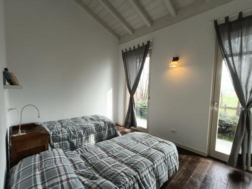 Cascina Borgofranconeにあるベッド