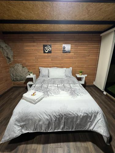 Una cama o camas en una habitación de Glamping Waná