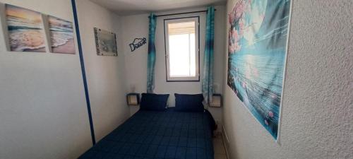 Postel nebo postele na pokoji v ubytování Appartement MALYA avec vue mer sur ponton de Port Leucate