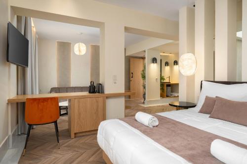 Postel nebo postele na pokoji v ubytování Dea Del Porto Wellness & Spa Suites