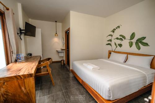 Postel nebo postele na pokoji v ubytování Diamond Beach Resort