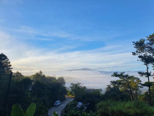 a view of a road with a view of the ocean at VidHuset Homestay Sagada in Sagada