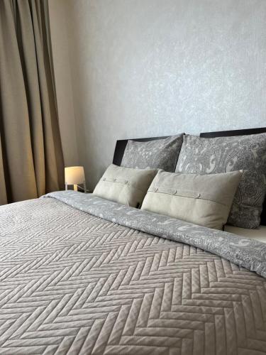 Katil atau katil-katil dalam bilik di Maxima apartments