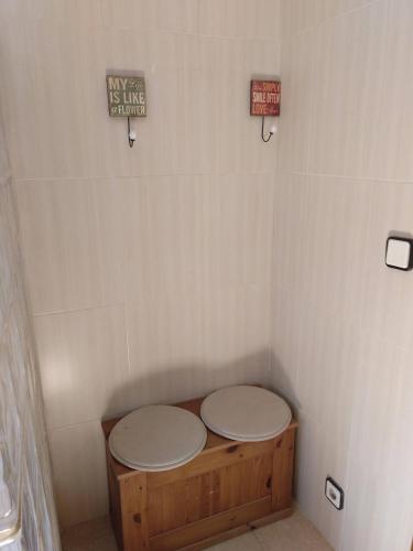 a small room with a toilet in the corner at Casa La Alegria in Maçanet de la Selva