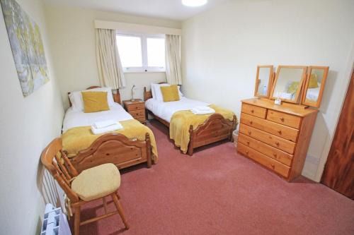 Postel nebo postele na pokoji v ubytování Glaslyn Harbour Views