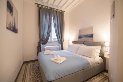 Postel nebo postele na pokoji v ubytování Verduci Home