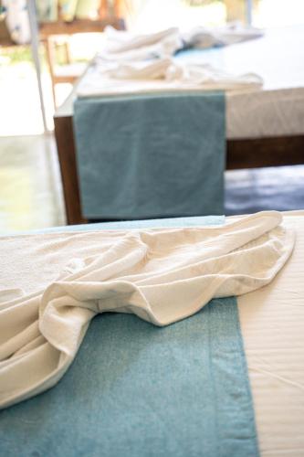 two beds sitting on top of a table at Cocos in Midigama
