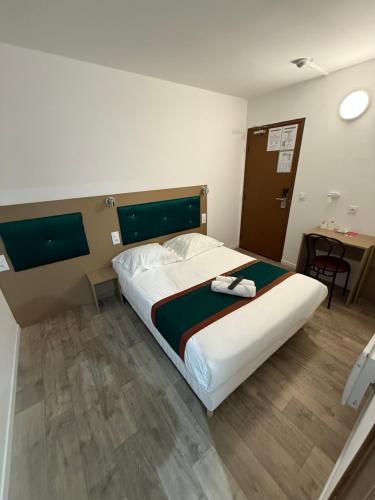 Postel nebo postele na pokoji v ubytování Fasthotel - Soissons Nord