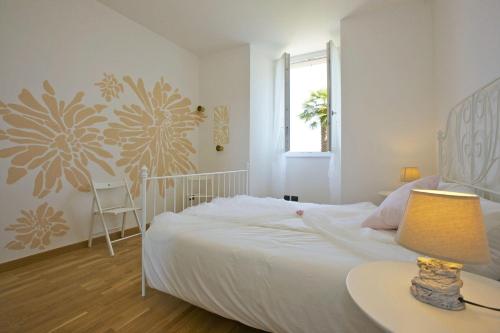 Posteľ alebo postele v izbe v ubytovaní Residence alle Ville