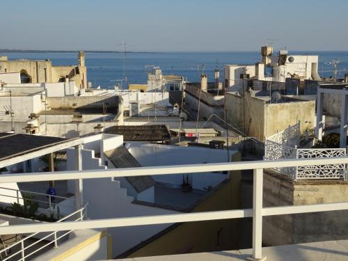 a view from the balcony of a building at Cinque terrazze - Casa d'epoca con vista mare in Gallipoli