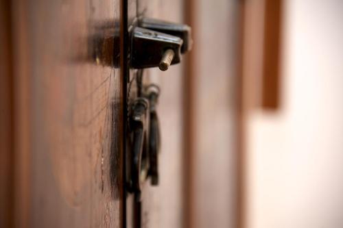 a close up of a door with a door knob at Villa Lieta in Ischia