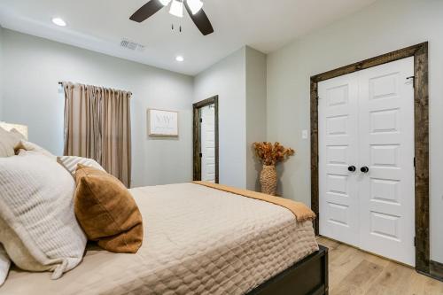 a bedroom with a bed and a ceiling fan at Bismarck Farm 2 BR 2 and a half BA New in San Angelo