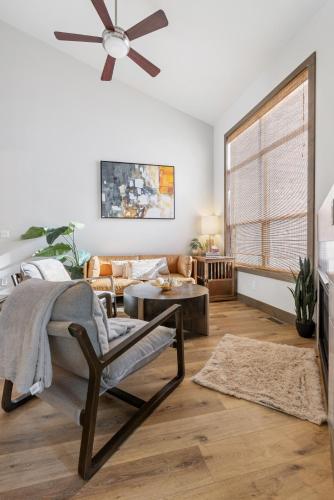 a living room with a ceiling fan and a couch at Perfectly Located 3 Bed 3.5 Bath Beautiful Townhome in Edwards
