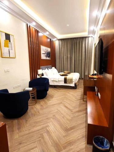 TV a/nebo společenská místnost v ubytování Smayah Hotel