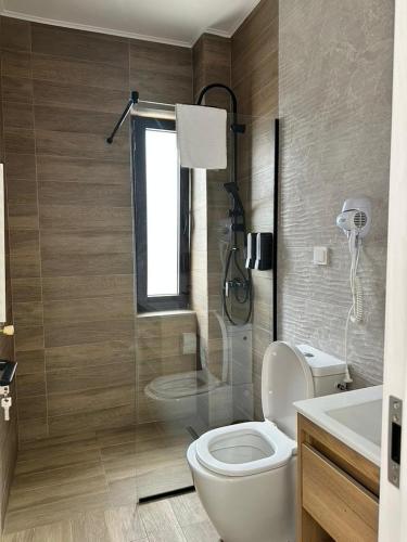 Bilik mandi di Pensiunea Apartamente 9 Baile Felix Otto 101