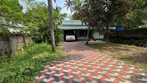 Zahrada ubytování Souparnika Homestay Varkala