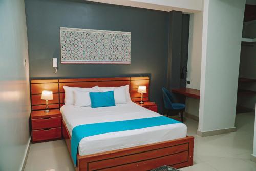 Ένα ή περισσότερα κρεβάτια σε δωμάτιο στο Nativo Hotel