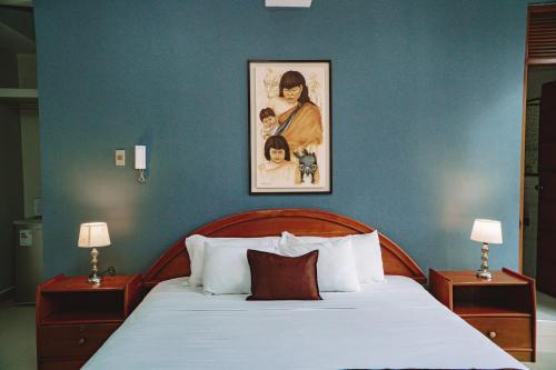 Ένα ή περισσότερα κρεβάτια σε δωμάτιο στο Nativo Hotel