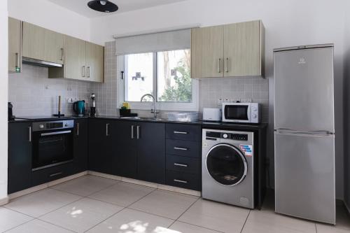 Nhà bếp/bếp nhỏ tại Nissini Villas
