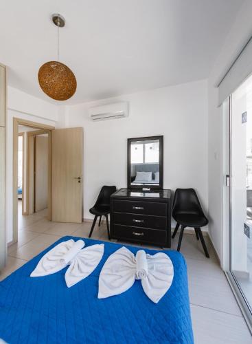 Giường trong phòng chung tại Nissini Villas